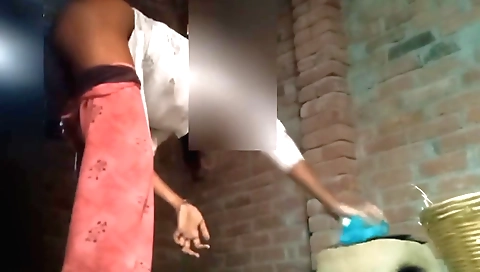 Indian girl with short hair is helping her family in making