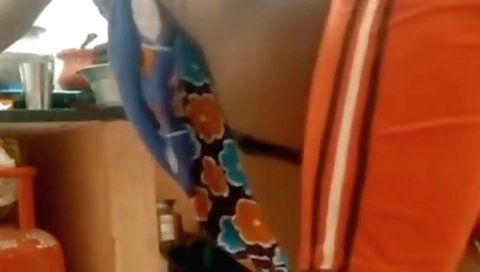 Indian brunette amateur girl shows her big tits in cooking