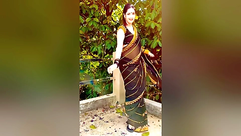 Indian amateur woman in black leather dress and jeans