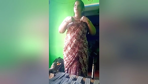 Indian naked porn video with a brunette in the bedroom