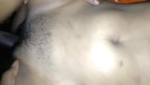 Hairy pussy of the girl is being fucked on a couch