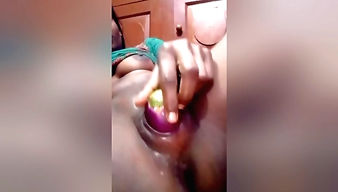 Indian brunette girl masturbates with her hands and clit