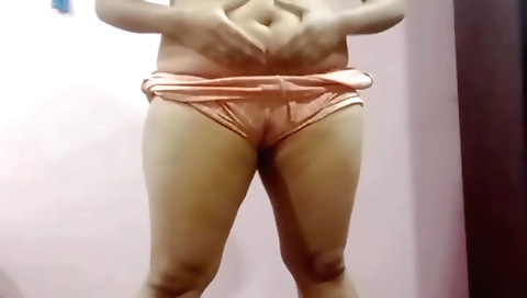 Hot nurse with a beautiful ass showing off her boobs