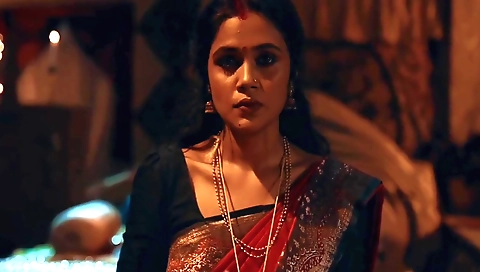 Busty indian babe with a shaved pussy giving a blowjob