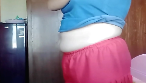 Indian chick is taking a hot shower and getting naked