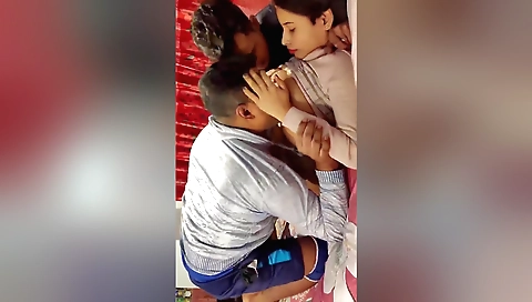 Busty brunette and her guy are having a threesome in webcam