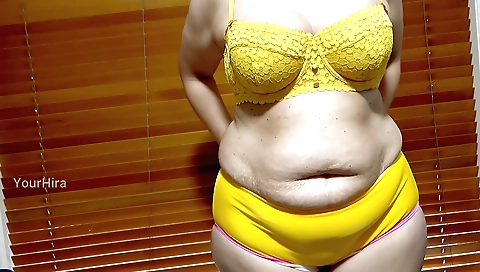 Busty wife changes out her bra and cock in front of the camera