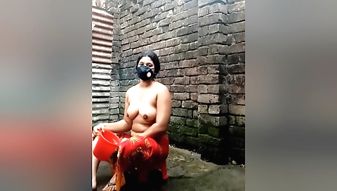 Indian girl with big boobs fills her shower with stick