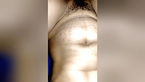 Hairy amateur with natural hairy beard is playing with a vibrator