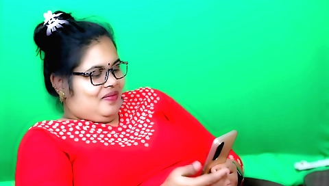 Sexy brunette in red dress and glasses is fucking herself