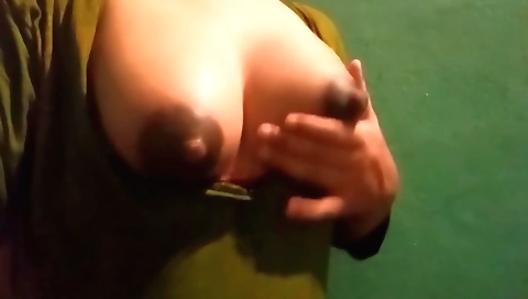 Busty chick shows her huge tits in her stepmom's house