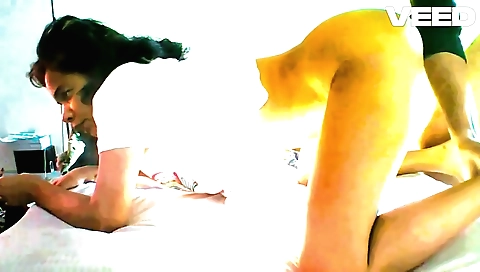 Indian yoga babe in red pants takes on yoga exercise