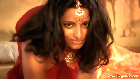 Brunette brunette is giving a sexy massage on the massage table