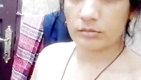 Busty Indian housewife in red dress makes homemade video