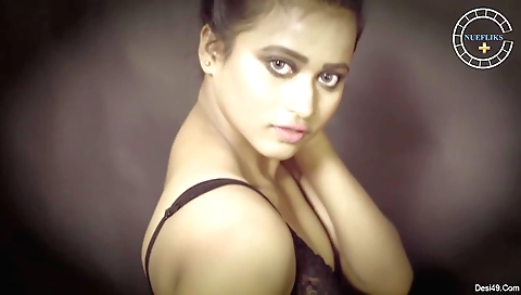 Beautiful brunette naked and sexy in a black outfit