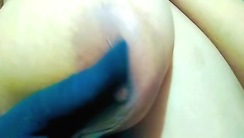 Pretty blonde showing off her nice boobs in the bedroom