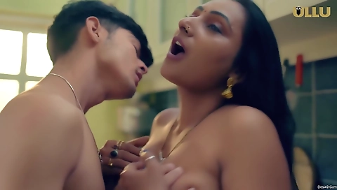 Busty brunette milf in stockings and a dress is masturbating