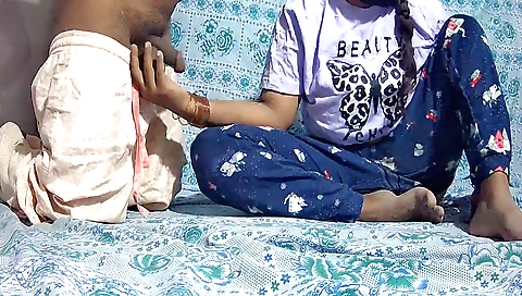 Indian girl gets a handjob on the bed before her porn clip