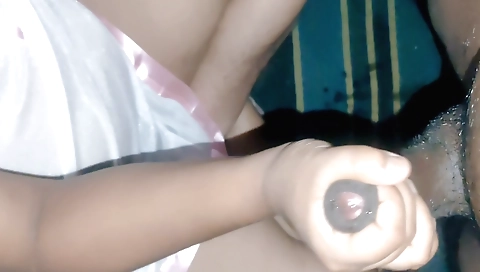 Indian girl in a sexy outfit is giving a handjob and taking a cock