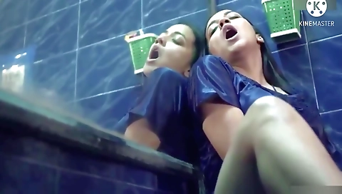 Brunette girl with beautiful lips is fingering her pussy