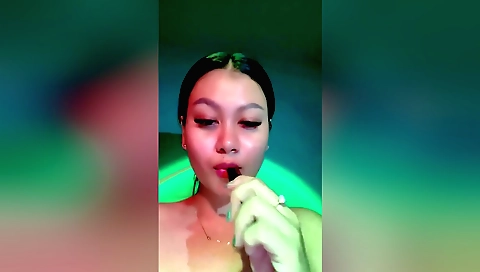 Hairy teen plays with her pussy in the living room