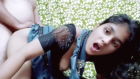 Indian woman gets ready to eat spicy food with her husband